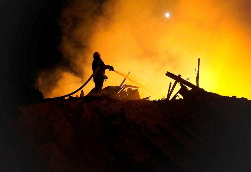 A firefighter extinguishes a fire in the aftermath of an attack, amid Russia's attack on Ukraine, given as Starokostiantyniv, Khmelnytskyi Region, Ukraine, in this handout photo released on August 6, 2023, courtesy of the Khmelnytskyi region administration/Handout via REUTERS THIS IMAGE HAS BEEN SUPPLIED BY A THIRD PARTY MANDATORY CREDIT TPX IMAGES OF THE DAY