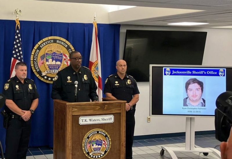 The photograph of Ryan Christopher Palmeter, 21, is shown at a news conference after being identified by Sheriff T.K. Waters as the white man who killed three Black people before shooting himself at a Dollar General store August 26