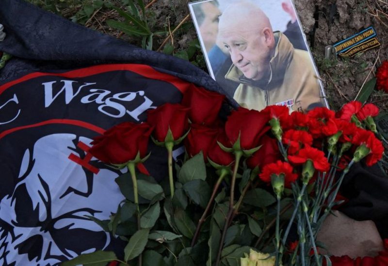 A view shows a portrait of Wagner mercenary chief Yevgeny Prigozhin at a makeshift memorial near former PMC Wagner Centre in Saint Petersburg, Russia August 24, 2023. REUTERS