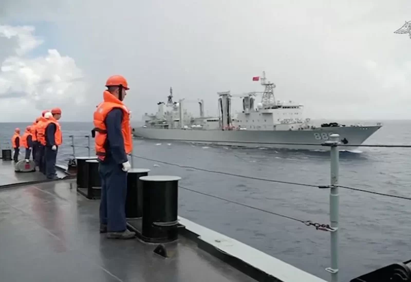 A still image from a video, released by Russia's Defence Ministry, shows what it said to be Russian and Chinese navy ships jointly patrolling the Pacific Ocean and holding naval exercises in the East China Sea, in this image taken from footage released August 18, 2023. Russian Defence Ministry/Handout via REUTERS