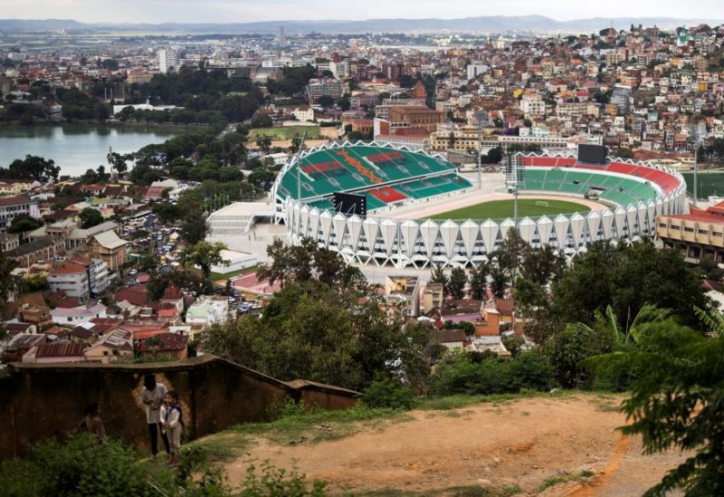 Children stand on a hill as the Mahamasina Municipal Stadium is seen in the background in Antananarivo, Madagascar, February 3, 2022. REUTERS/Alkis Konstantinidis/File Photo