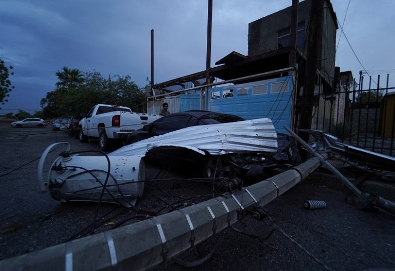 A car hit by a light pole as Tropical Storm Hilary hits Baja California state, in Mexicali, Mexico, August 20, 2023. REUTERS/Victor Medina