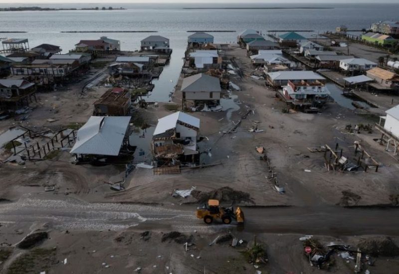 Houses and businesses are seen damaged in the aftermath of Hurricane Ida as the Category 4 hurricane devastated the town and barrier island of Grand Isle, Louisiana, U.S., September 2, 2021. Picture taken with a drone. REUTERS/Adrees Latif/File Photo
