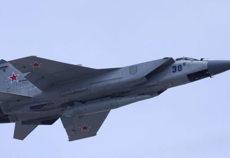 A Russian MiG-31 fighter jet equipped with a Kinzhal hypersonic missile flies over Red Square during a rehearsal for a flypast, part of a military parade marking the anniversary of the victory over Nazi Germany in World War Two, in central Moscow, Russia May 7, 2022. REUTERS/Maxim Shemetov/file photo