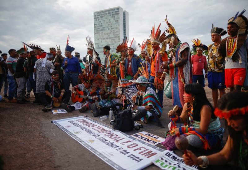 Brazilian indigenous peoples gather as the Supreme Court on weighing the constitutionality of laws to limit the ability of Indigenous peoples to win protected status for ancestral lands, in Brasilia, Brazil August 30, 2023. REUTERS/Adriano Machado/File Photo