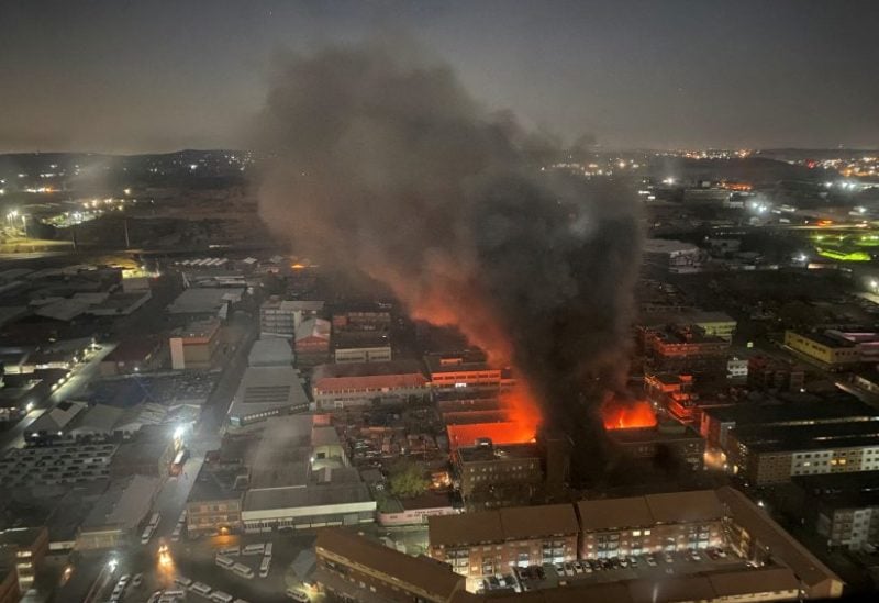 Smoke rises from a burning building amid a deadly fire, in Johannesburg, South Africa, August 31, 2023, in this image obtained from social media. X/@odirileram/via REUTERS/File Photo