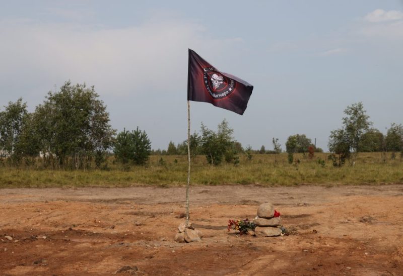 A view shows a flag of the Wagner private mercenary group at the site of the plane crash that killed Wagner PMC top figures, including Yevgeny Prigozhin and Dmitry Utkin, in the Tver Region, Russia September 1, 2023. PICTURE OBTAINED BY REUTERS