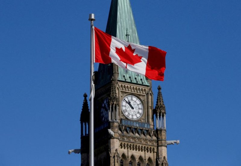Canadian flag flies in front of the Peace Tower on Parliament Hill in Ottawa, Ontario, Canada, March 22, 2017. REUTERS/Chris Wattie/File Photo