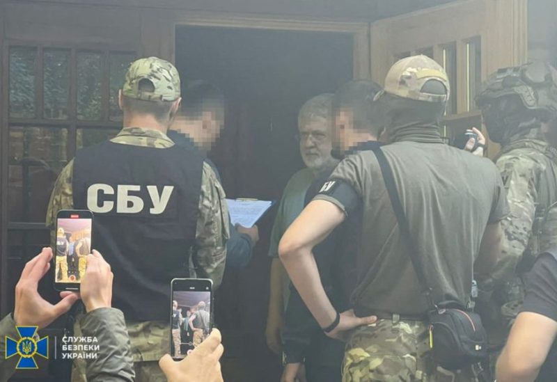 Ukrainian business tycoon and one of Ukraine's most prominent billionaires Ihor Kolomoisky speaks with Security Service of Ukraine (SBU) and Prosecutor General's Office officers at an unknown location, in this picture released on September 2, 2023. Security Service of Ukraine/Handout via REUTERS