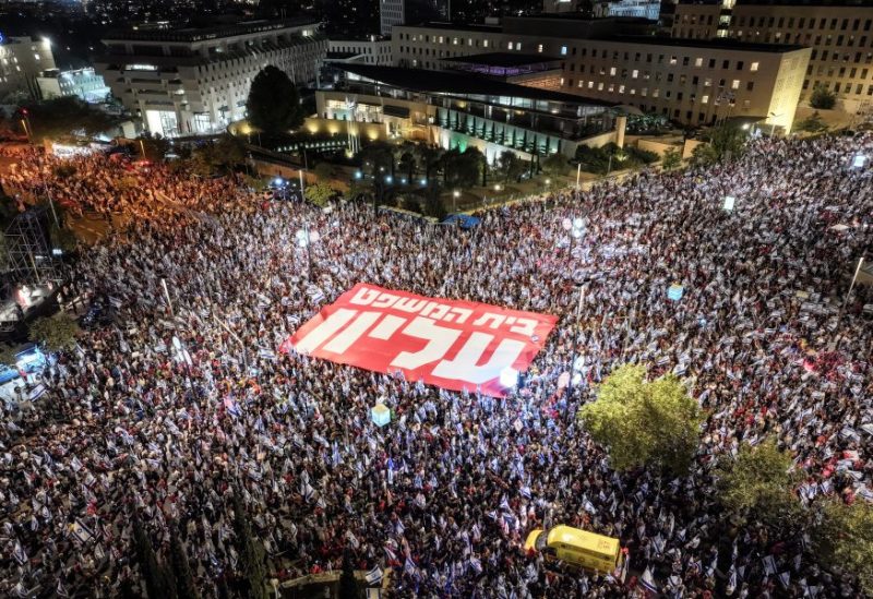 An aerial view shows people taking part in a demonstration against Israeli Prime Minister Benjamin Netanyahu and his nationalist coalition government's judicial overhaul ahead of an appeal against an amendment that curbs some powers of the Supreme Court, in Jerusalem, September 11, 2023