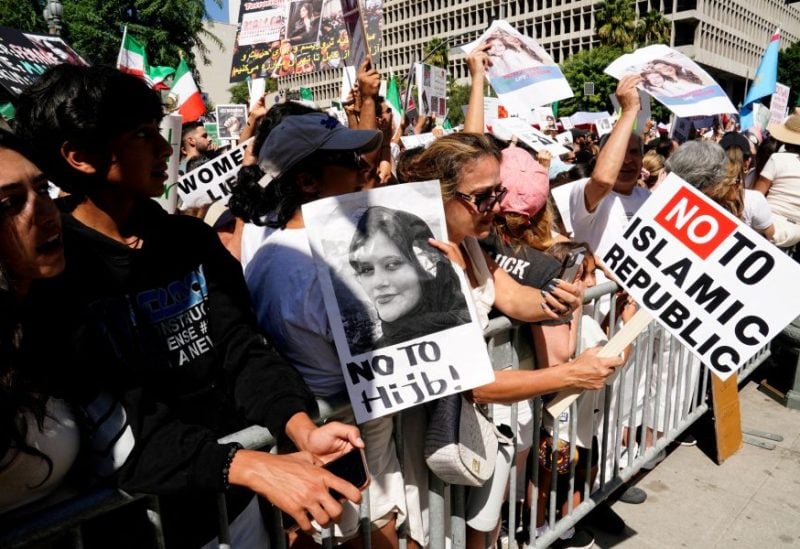 Demonstrators at a Freedom Rally for Iran, protesting in support of Iranian women and against the death of Mahsa (Zhina) Amini, outside City Hall in Los Angeles, California, U.S., October 1, 2022. REUTERS/Bing Guan/File photo