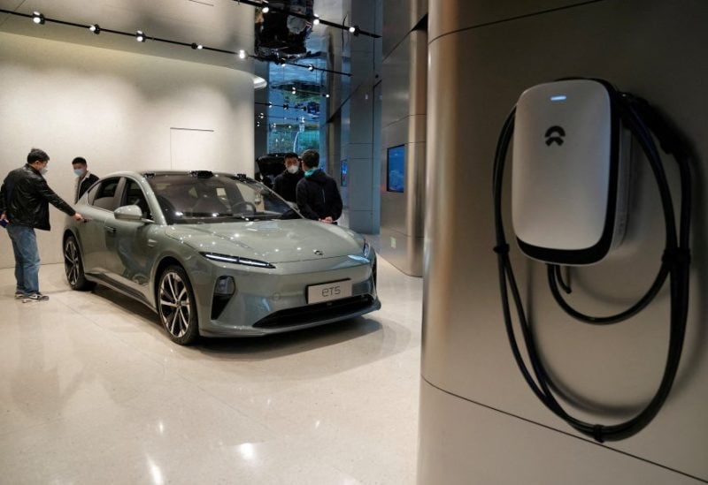 A Nio ET5 electric vehicle is displayed at the Chinese EV maker's showroom in Shanghai, China, February 3, 2023. REUTERS/Aly Song/File Photo