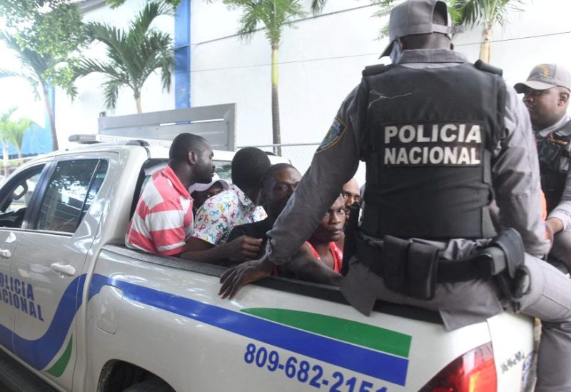 Police officers ride with detained Haitian nationals to a migration clearance centre to verify their papers as the government is stepping up deportations, in Santo Domingo, Dominican Republic November 15, 2022. Raul Asencio/Courtesy by Listin Diario/via REUTERS /File Photo
