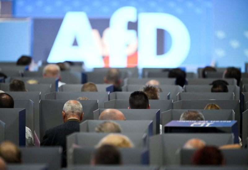 AfD members sit in voting booths on the day of the European election assembly 2023 of the Alternative for Germany (AfD) in Magdeburg, Germany, July 29, 2023. REUTERS/Annegret Hilse/File Photo