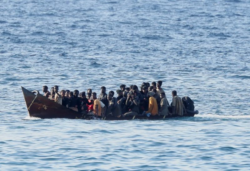 A vessel with migrants approaches the Sicilian island of Lampedusa, Italy, September 16, 2023. REUTERS/Yara Nardi
