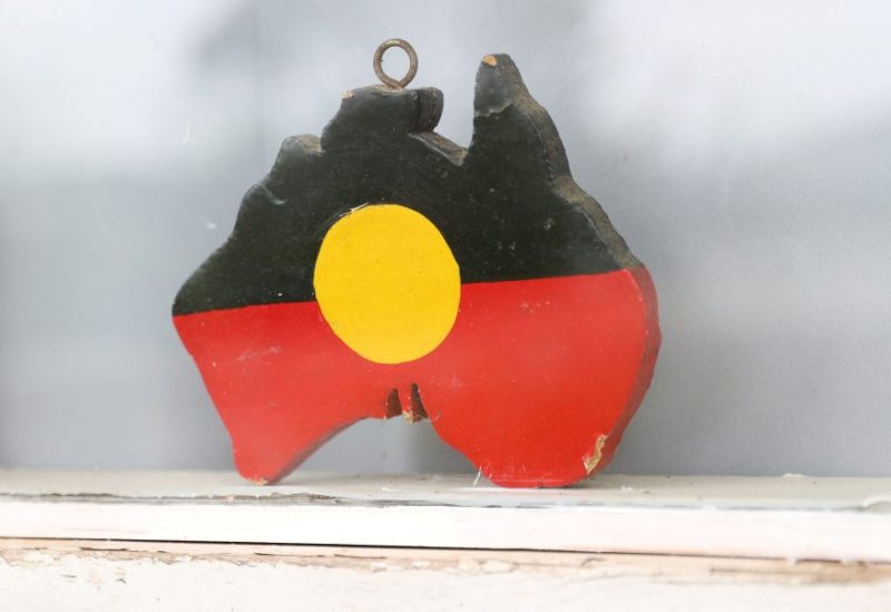 A depiction of the Australian Aboriginal Flag is seen on a window sill at the home of indigenous Muruwari elder Rita Wright, a member of the "Stolen Generations", in Sydney, Australia, January 19, 2021. Picture taken January 19, 2021. REUTERS/Loren Elliott
