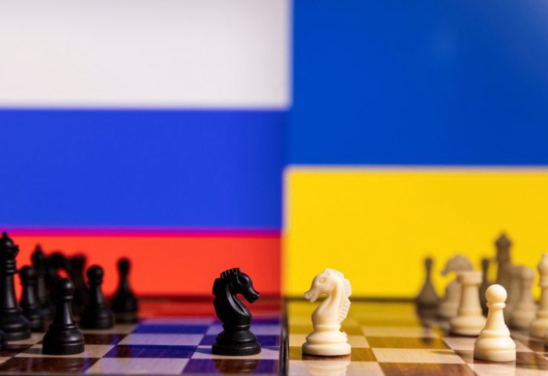 Chess pieces are seen in front of displayed Russia and Ukraine's flags in this illustration taken January 25, 2022. REUTERS/Dado Ruvic/Illustration/File Photo
