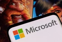 Microsoft logo is seen on a smartphone placed on displayed Activision Blizzard's games characters in this illustration taken January 18, 2022. REUTERS/Dado Ruvic/Illustration/File Photo