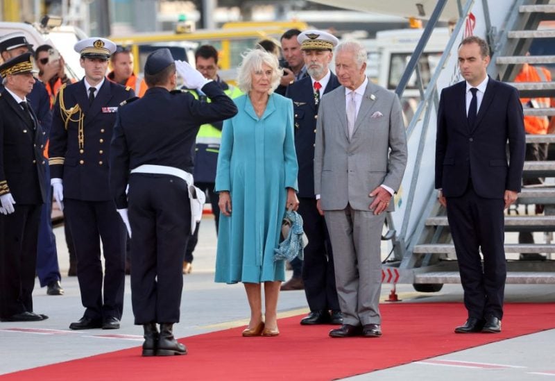 Queen Camilla and King Charles III receive the salute from a member of the French military at Bordeaux-Merignac Airport ahead of their departure for the United Kingdom, in Bordeaux, France on September 22, 2023. Chris Jackson/Pool via REUTERS