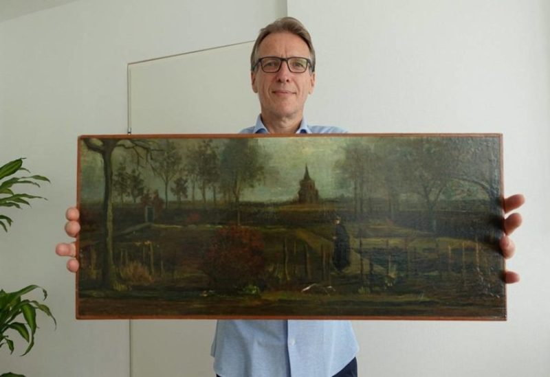 A handout picture released by Dutch art detective Arthur Brand shows a portrait of him posing with the painting title "Parsonage Garden at Nuenen in Spring", painted by Vincent van Gogh in 1884, at his home in Amsterdam on September 11, 2023. (AFP photo /Arthur Brand)