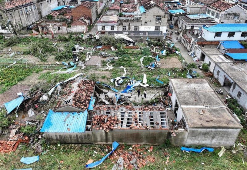 This aerial view shows damaged buildings after a tornado hit the city of Suqian, in China's eastern Jiangsu province on September 20, 2023. (Photo by AFP)