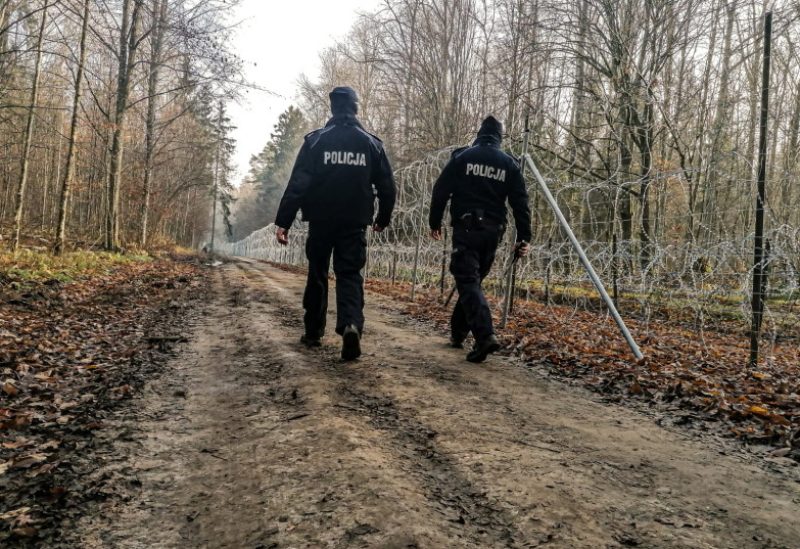 Polish mounted police guard area on the Poland/Belarus border near Kuznica, Poland, in this photograph released by the Police, November 11, 2021. (photo credit: POLICJA PODLASKA / HANDOUT VIA REUTERS)