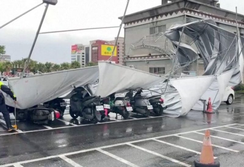 A collapsed canopy is seen at a parking lot as Typhoon Haikui approaches, in Hualien, Taiwan September 3, 2023,