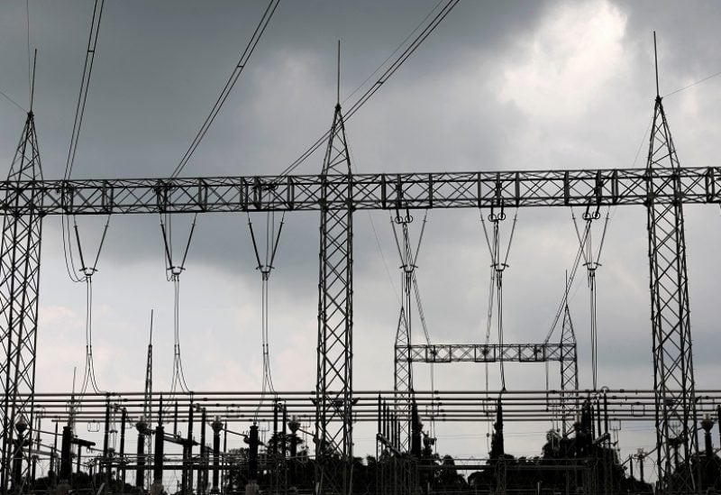 FILE PHOTO: High-tension electrical power lines are seen at the Azura-Edo Independent Power Plant (IPP) on the outskirt of Benin City in Edo state, Nigeria June 13, 2018. Picture taken June 13, 2018. REUTERS/Akintunde Akinleye/File Photo