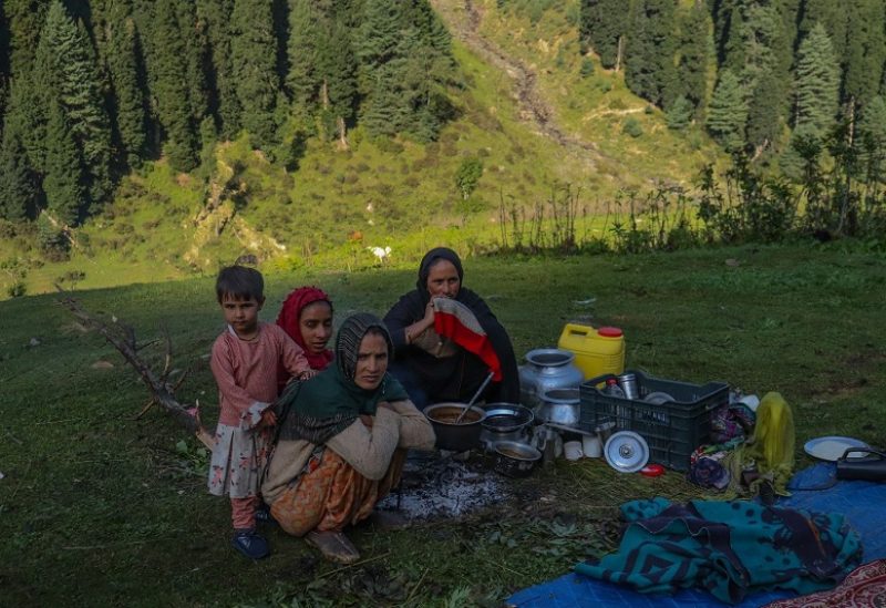 Ruksana (front), a member of the Gujjar nomadic community, lost a baby when heavy rain and strong winds made it difficult to get to the nearest hospital when she went into early labour, in Aru Valley, Jammu and Kashmir, India, Sept. 14, 2022. Thomson Reuters Foundation/Shafqat Khursheed