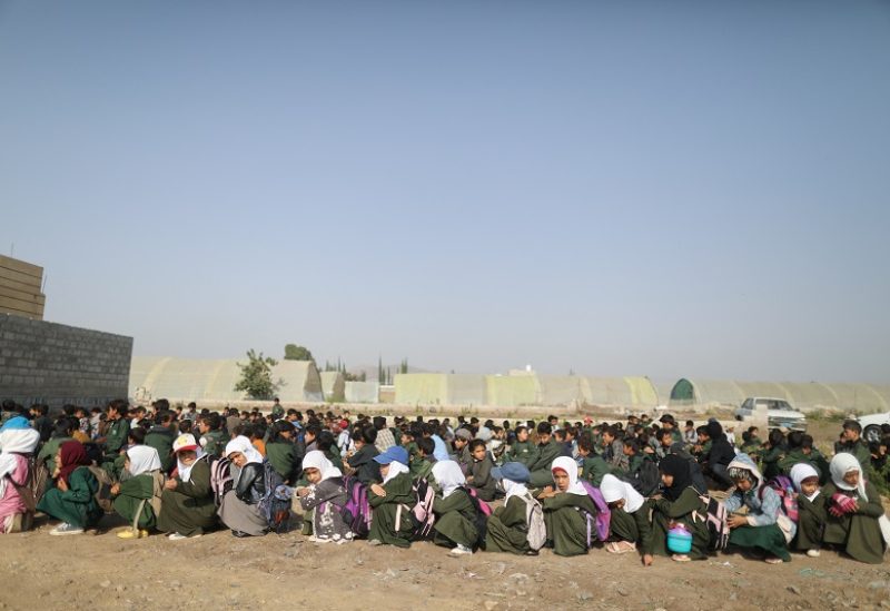Students wait for the opening of a new school built by the local charity Mona Relief, as students face challenges in Yemen amid the ongoing conflict that has disrupted infrastructure and damaged many schools affecting access to education, on the outskirts of Sanaa, Yemen September 2, 2023. REUTERS/Khaled Abdullah