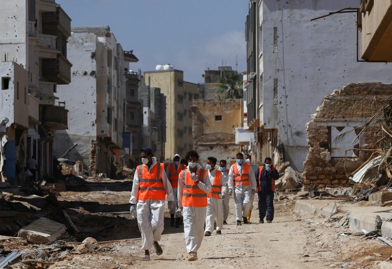 Search and rescue volunteers walk in Derna, following fatal floods in Derna, Libya, September 19, 2023. REUTERS/Amr Alfiky