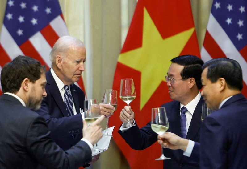 U.S. President Joe Biden raises a toast with Vietnam's President Vo Van Thuong at the Presidential Palace in Hanoi, Vietnam, September 11, 2023. REUTERS/Evelyn Hockstein