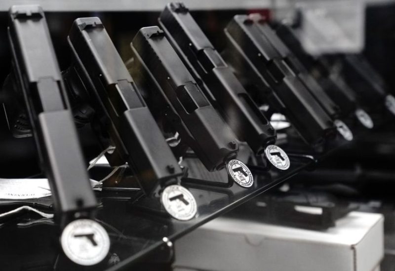 Glock semi-automatic pistols are displayed for sale at Firearms Unknown, a gun store in Oceanside, California, U.S., April 12, 2021. REUTERS/Bing Guan/File Photo