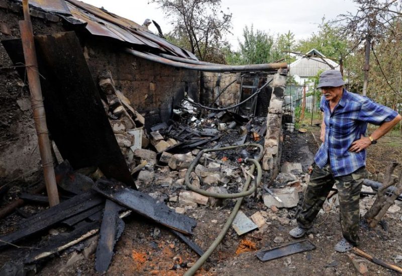 Local resident Vladislav Driga, 75, stands next to the ruins of his outbuilding destroyed by recent shelling in the course of Russia-Ukraine conflict in Donetsk, Russian-controlled Ukraine, September 1, 2023. REUTERS