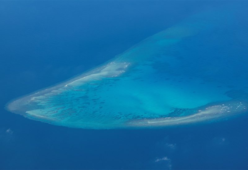 An aerial view of Iroquois Reef, frequented by Filipino fishermen and part of the Philippine 200-mile exclusive economic zone, in the South China Sea, March 9, 2023. (Reuters/Eloisa Lopez)