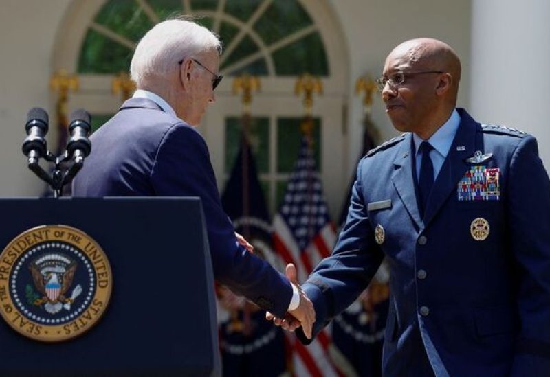 U.S. President Joe Biden congratulates U.S. Air Force General Charles Brown Jr. after announcing his nomination of Brown to serve as the next chairman of the U.S. Joint Chiefs of Staff, during an event in the Rose Garden at the White House in Washington, U.S., May 25, 2023. REUTERS/Evelyn Hockstein/File photo