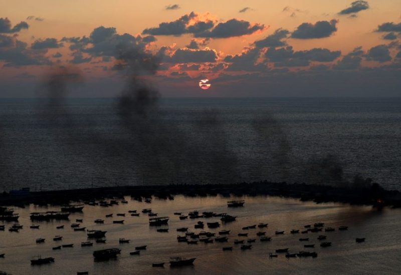 Smoke rises after Israeli strikes on the seaport of Gaza City, in Gaza, October 10, 2023. REUTERS