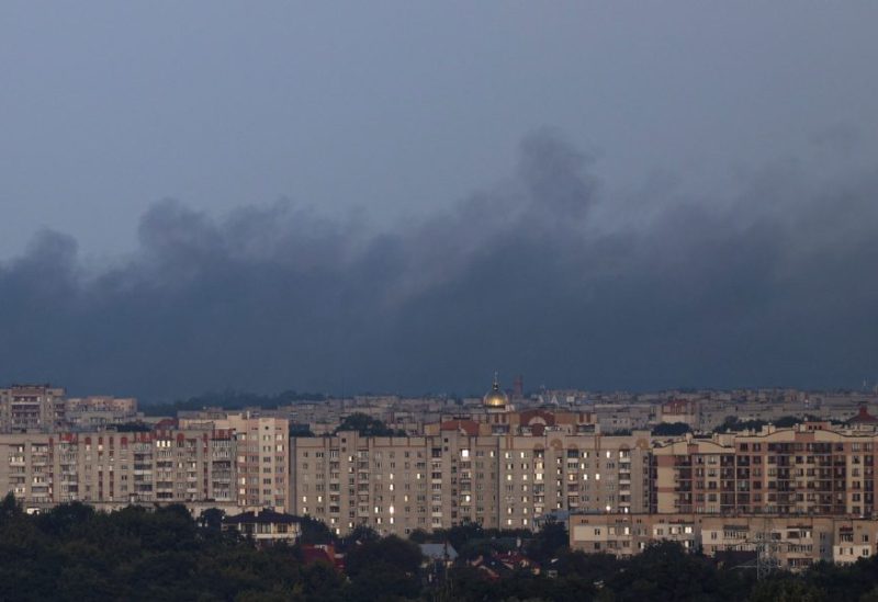 Smoke rises over apartment buildings after a Russian drone strike, amid Russia's attack on Ukraine, in Lviv, Ukraine September 19, 2023. REUTERS/Stringer