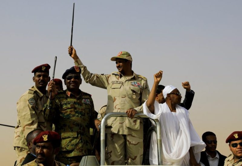 Lieutenant General Mohamed Hamdan Dagalo, deputy head of the military council and head of paramilitary Rapid Support Forces (RSF), greets his supporters as he arrives at a meeting in Aprag village, 60 kilometers away from Khartoum, Sudan, June 22, 2019. REUTERS/Umit Bektas/File Photo