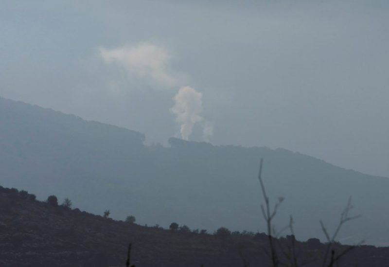 Smoke rises from Halta village as seen from Ibl al-Saqi village in southern Lebanon, near the border with Israel, southern Lebanon, October 8, 2023. REUTERS/Aziz Taher REFILE - QUALITY REPEAT
