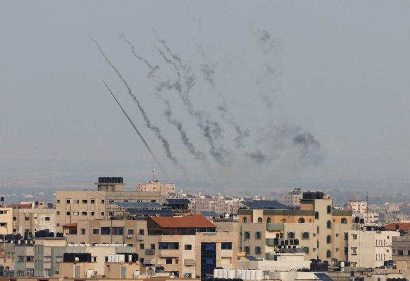 Rockets are fired from Gaza toward Israel, in Gaza, October 8, 2023. REUTERS/Mohammed Salem