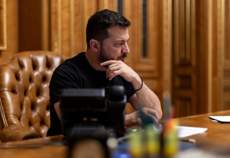 Ukraine's President Volodymyr Zelenskiy attends a phone call with Israeli Prime Minister Benjamin Netanyahu, following Hamas' biggest attack on Israel, in Kyiv, Ukraine October 8, 2023. Ukrainian Presidential Press Service/Handout via REUTERS