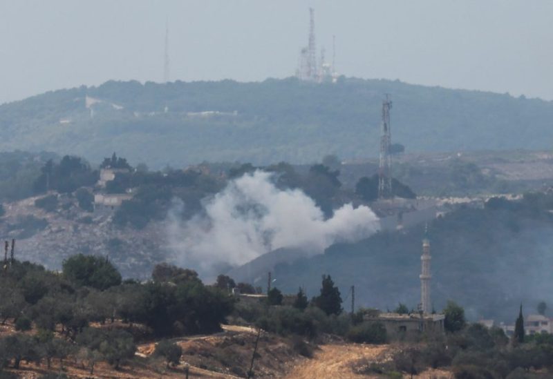 Smoke rises from Dhayra village after Israeli shelling as pictured from the Lebanese town of Marwahin, near the border with Israel, southern Lebanon, October 11, 2023. REUTERS/Mohamed Azakir