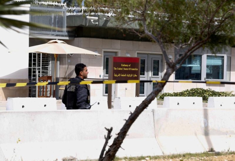 A police officer walks outside the U.S. embassy after a suicide attack in Tunis, Tunisia March 6, 2020. REUTERS/Zoubeir Souissi/File Photo