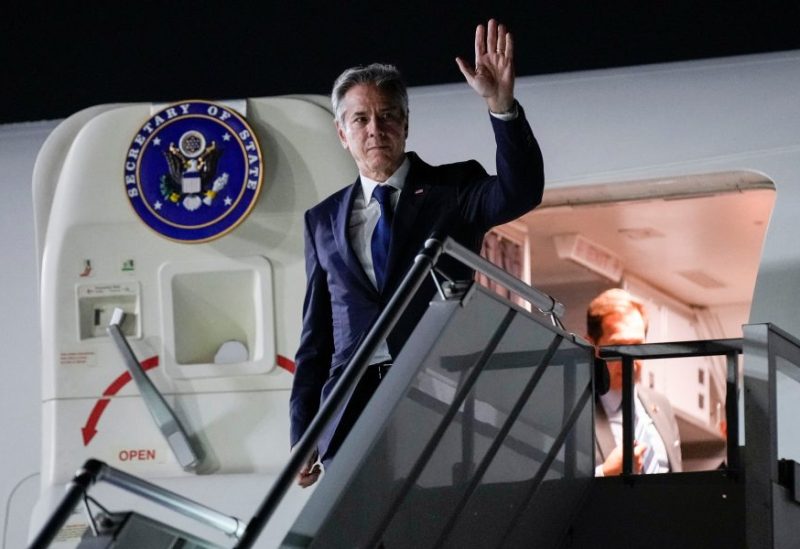 U.S. Secretary of State Antony Blinken waves as he arrives in Riyadh, Saudi Arabia, Saturday, Oct. 14, 2023, after making a day trip to the United Arab Emirates. Jacquelyn Martin/Pool via REUTERS