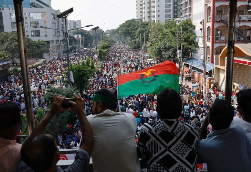 Supporters of Bangladesh Nationalist Party (BNP) wave party flag during a rally at Naya Paltan area in Dhaka, Bangladesh, October 28, 2023. REUTERS/Mohammad Ponir Hossain