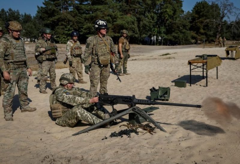 Commander of the Joint Forces of the Armed Forces of Ukraine Serhiy Nayev fires an American Browning M2 machine gun during a military exercise, amid Russia's attack on Ukraine, in Kyiv region, Ukraine September 27, 2023