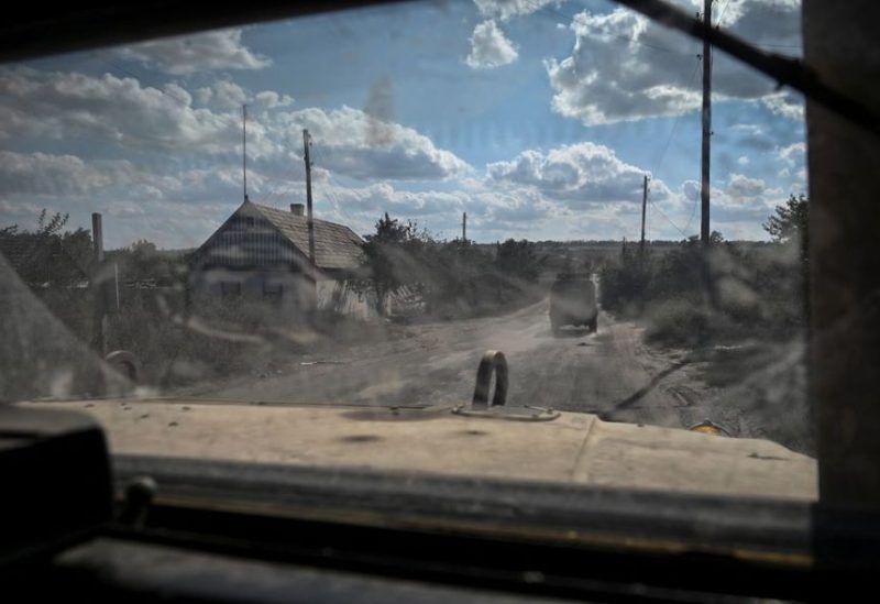 A military vehicle carrying servicemen of Ukraine’s 3rd Separate Assault Brigade drives down a road during a reconnaissance mission, amid Russia's attack on Ukraine, near Bakhmut, Ukraine September 7, 2023. REUTERS