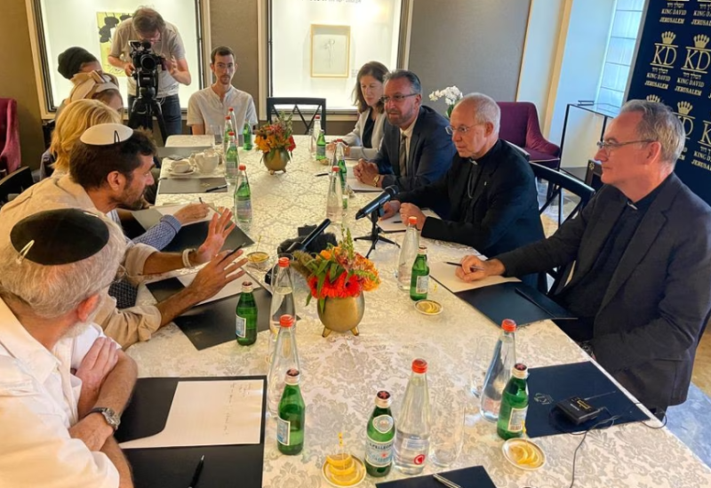 Archbishop of Canterbury Justin Welby meets with the parents and extended family of 22-year-old Yosef Malachi, who was killed in Kibbutz Kfar Aza following a deadly infiltration by Hamas gunmen, at the King David Hotel in Jerusalem October 22, 2023.