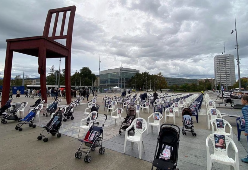 A group of Geneva citizens set up 222 empty chairs and strollers for children that symbolically represent hostages and missing people waiting to come home, following a deadly infiltration of Israel by Hamas gunmen from the Gaza Strip, on Place des Nations in front of the United Nations in Geneva
